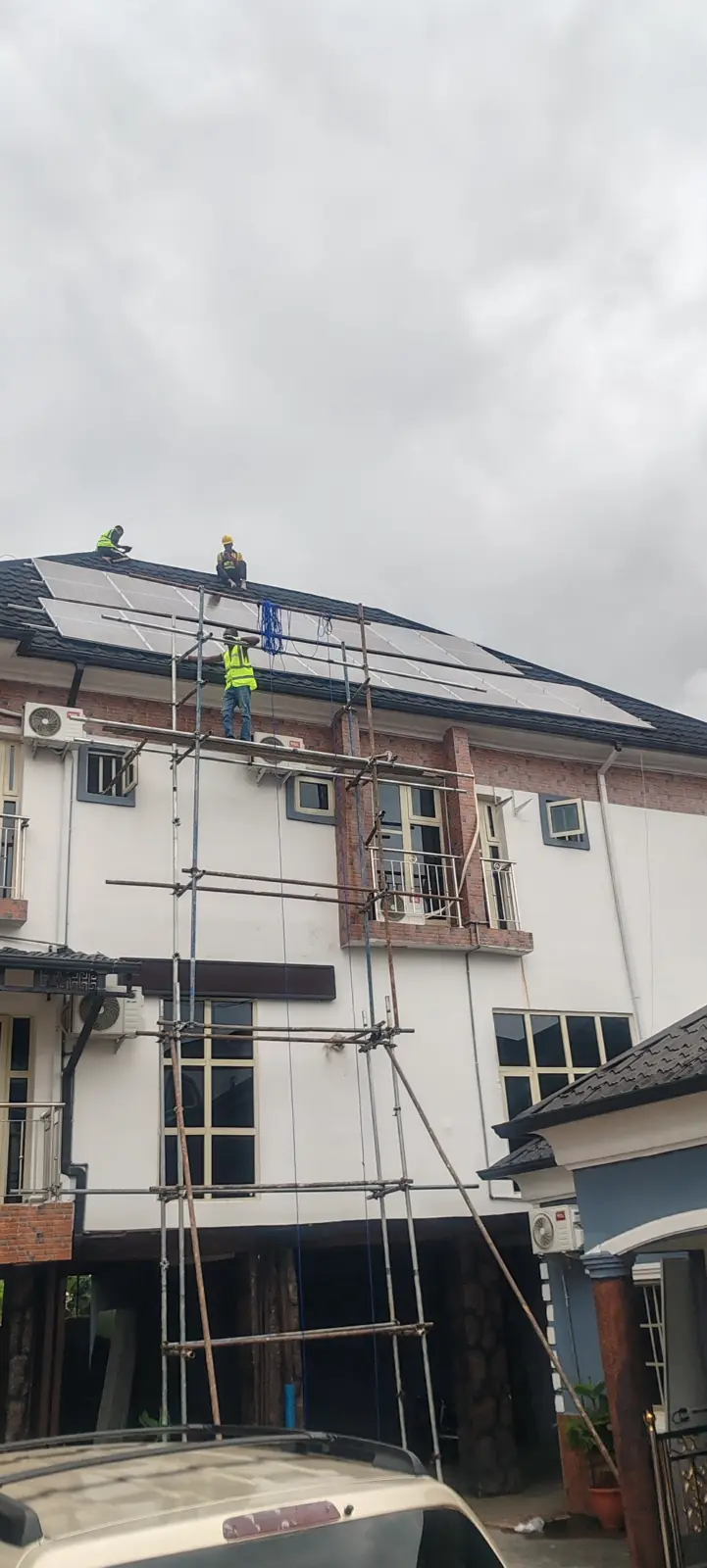 Talynex team working on a multi-storey building solar installation